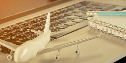 toy plane on computer