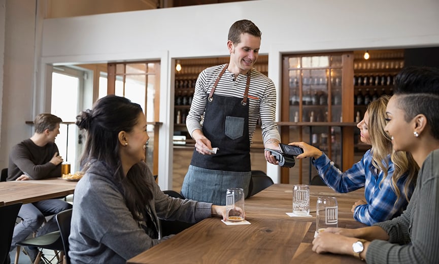 image of restaurant server taking a receipt for an unusual employee expense